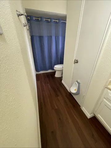 a kitchen with stainless steel appliances a sink and a refrigerator