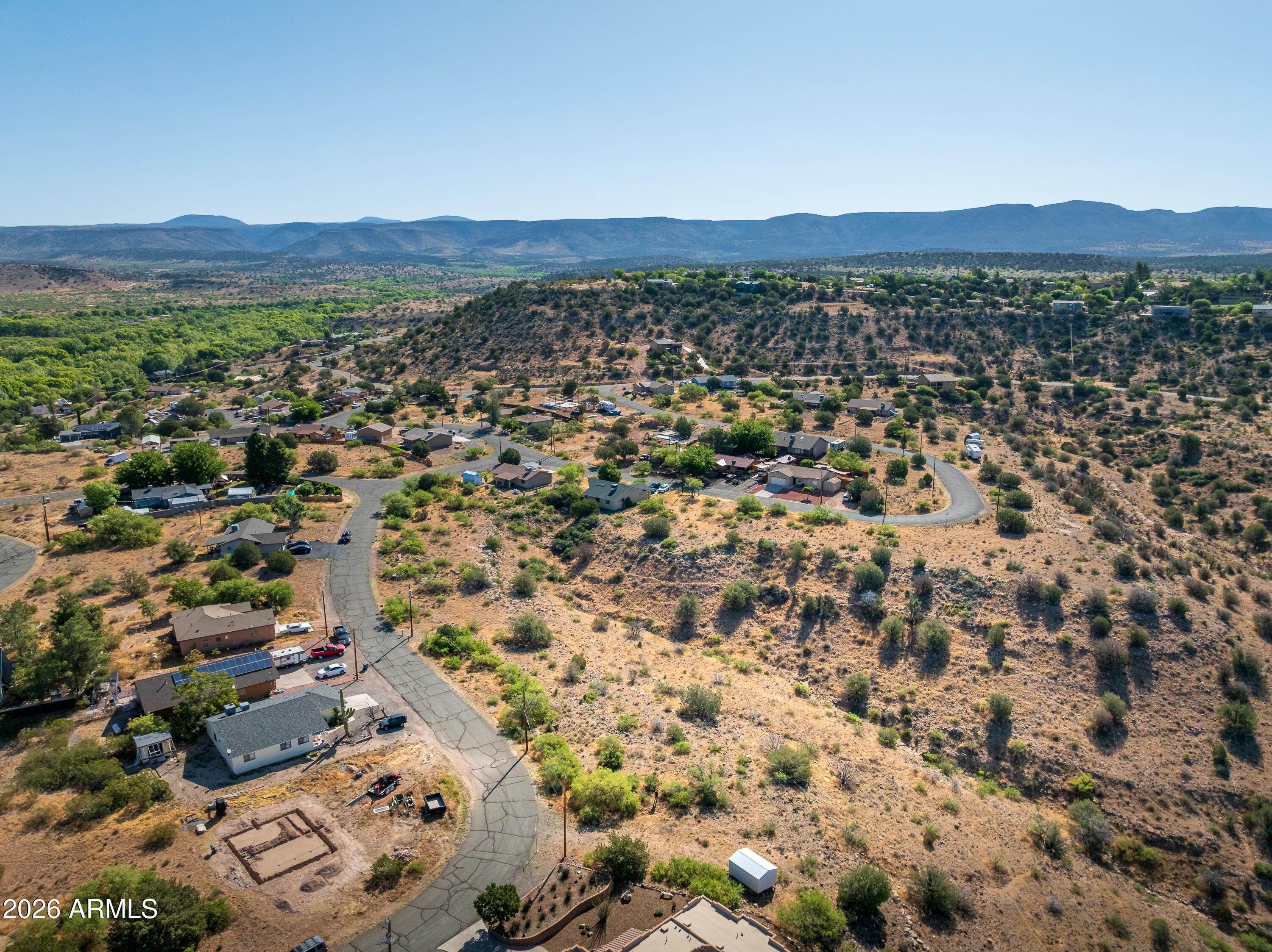 4505 Ghost Rider Way Rimrock, AZ 86335 - Photo 11 of 20 an aerial view of residential house and sandy dunes