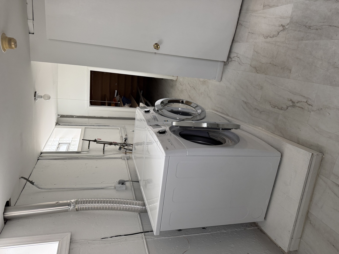 7736 West Strong Street Norridge, IL 60706 - Photo 18 of 23 a utility room with dryer and washer