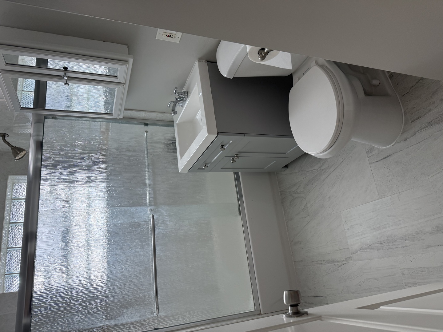 7736 West Strong Street Norridge, IL 60706 - Photo 23 of 23 a bathroom with a toilet and a shower