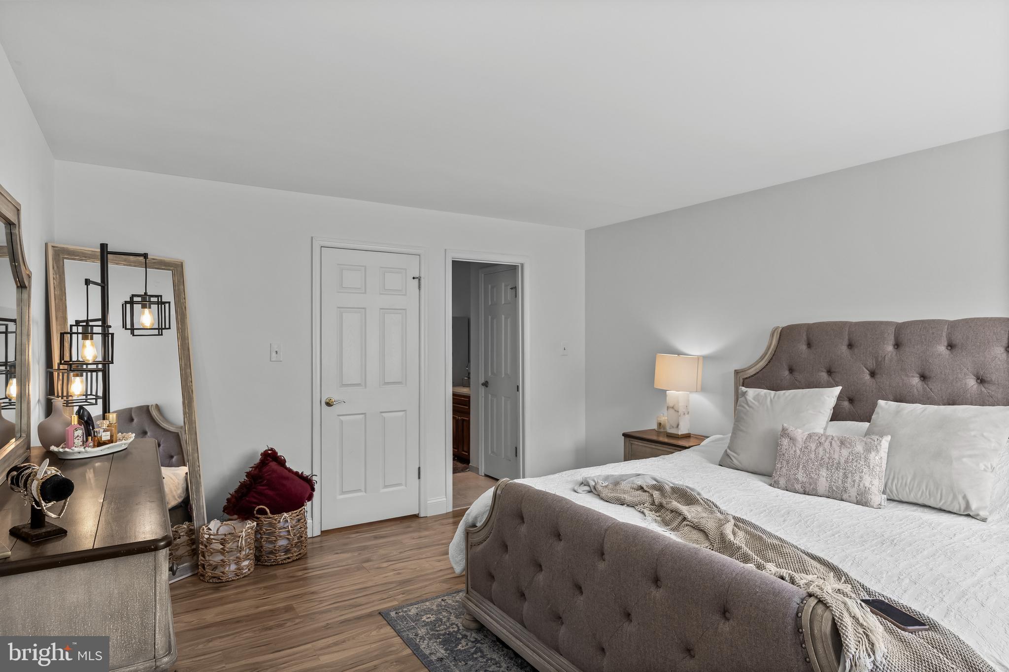 1 Neville Court Sewell, NJ 08080 - Photo 14 of 24 a bedroom with a bed and wooden floor