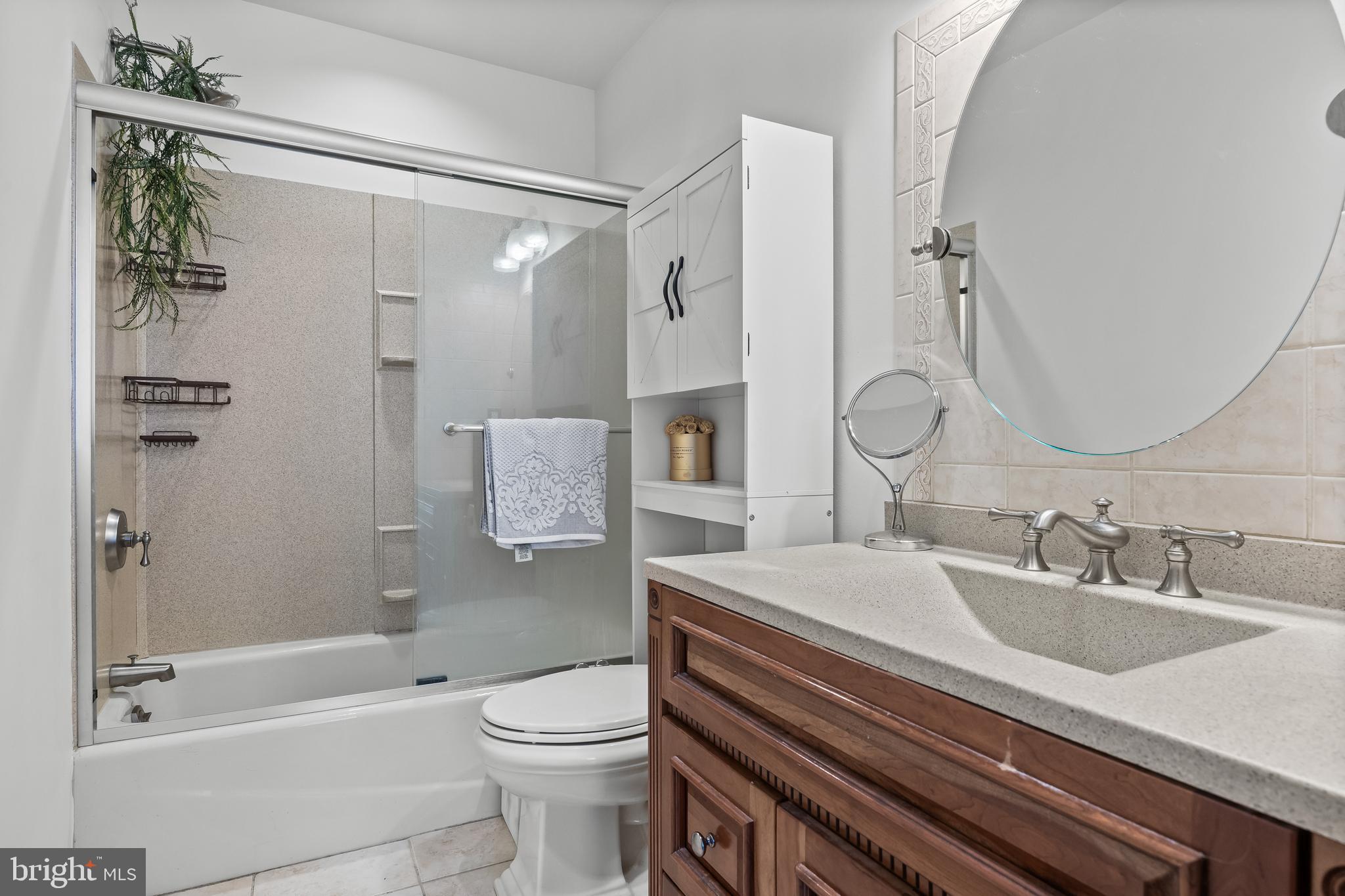 1 Neville Court Sewell, NJ 08080 - Photo 16 of 24 a bathroom with a sink a toilet and shower