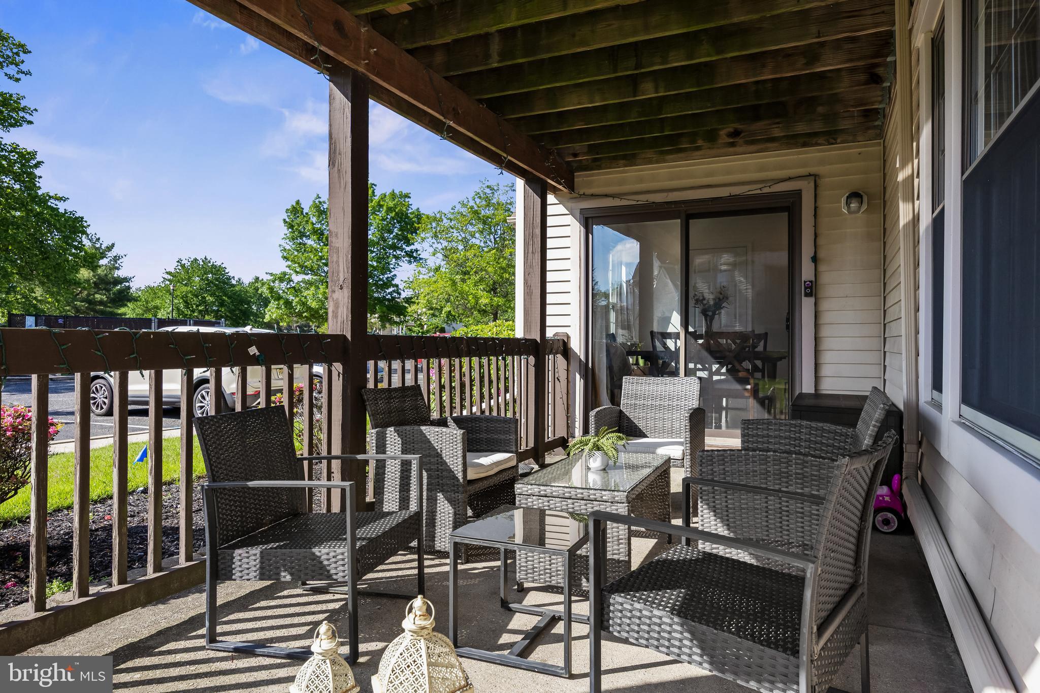 1 Neville Court Sewell, NJ 08080 - Photo 2 of 24 a view of a patio with a table chairs and backyard