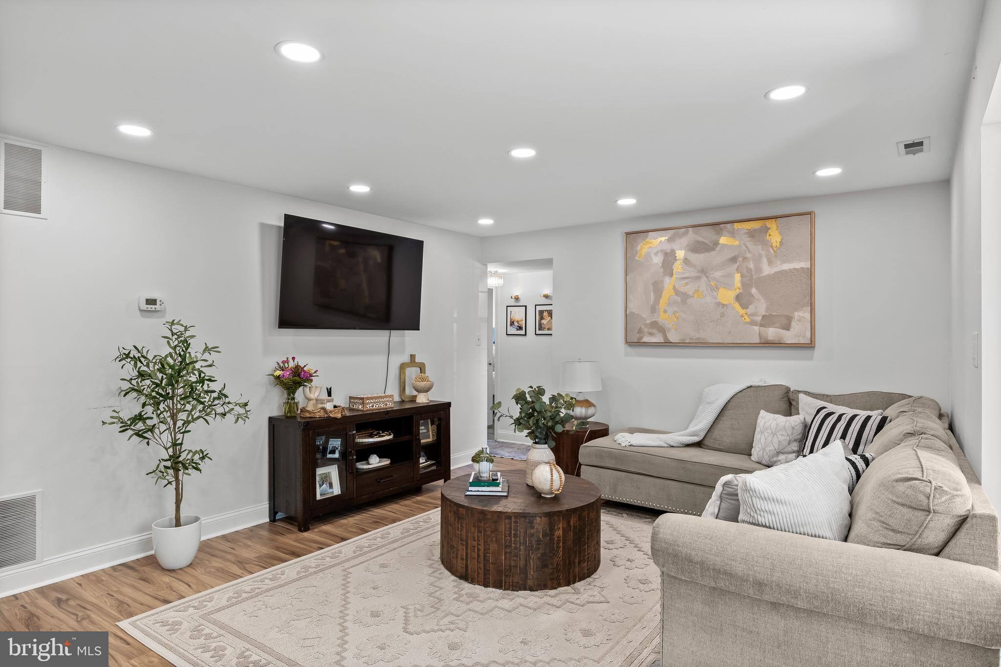 1 Neville Court Sewell, NJ 08080 - Photo 4 of 24 a living room with furniture and a flat screen tv