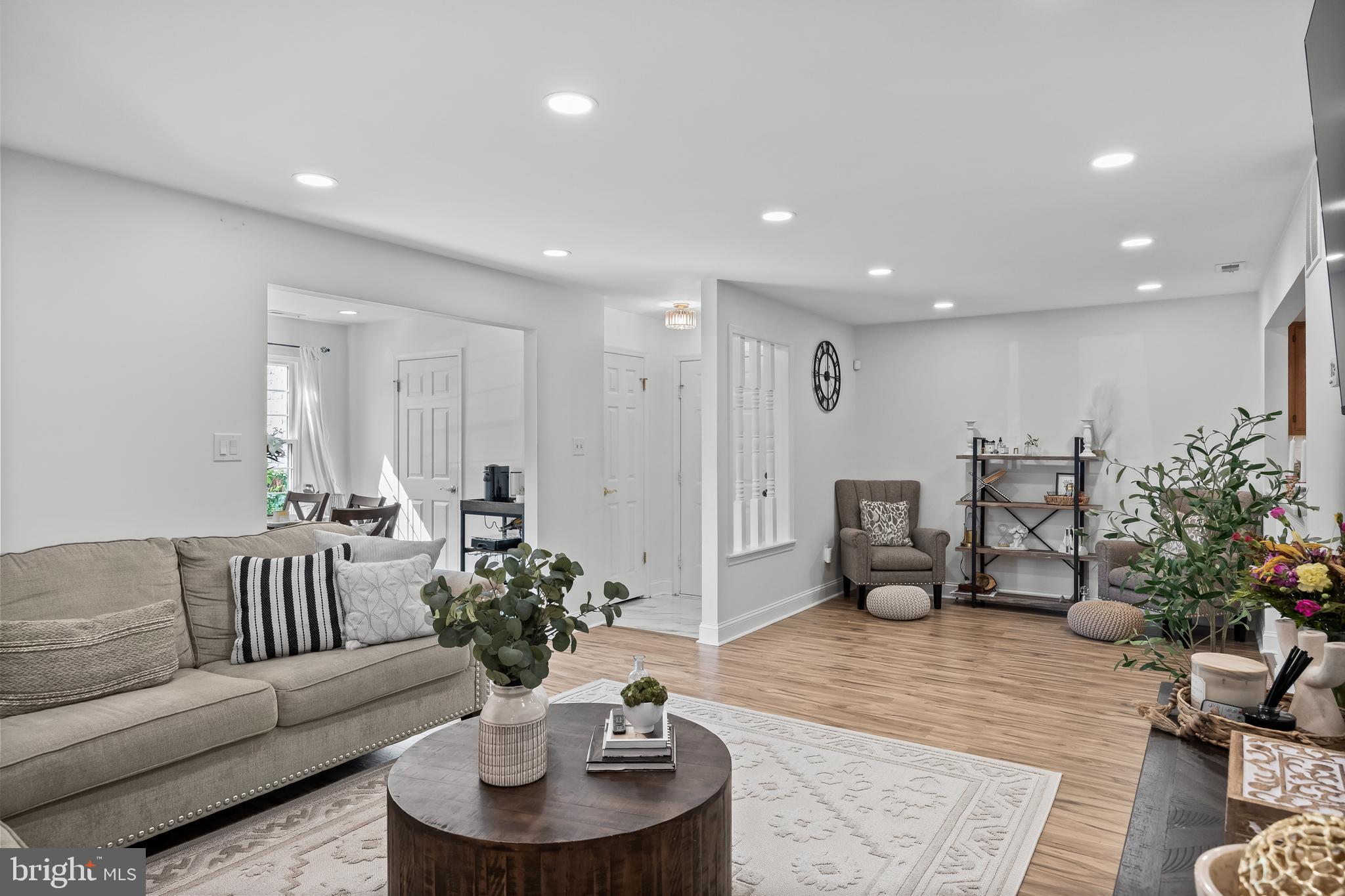 1 Neville Court Sewell, NJ 08080 - Photo 6 of 24 a living room with furniture and a dining table with garden view