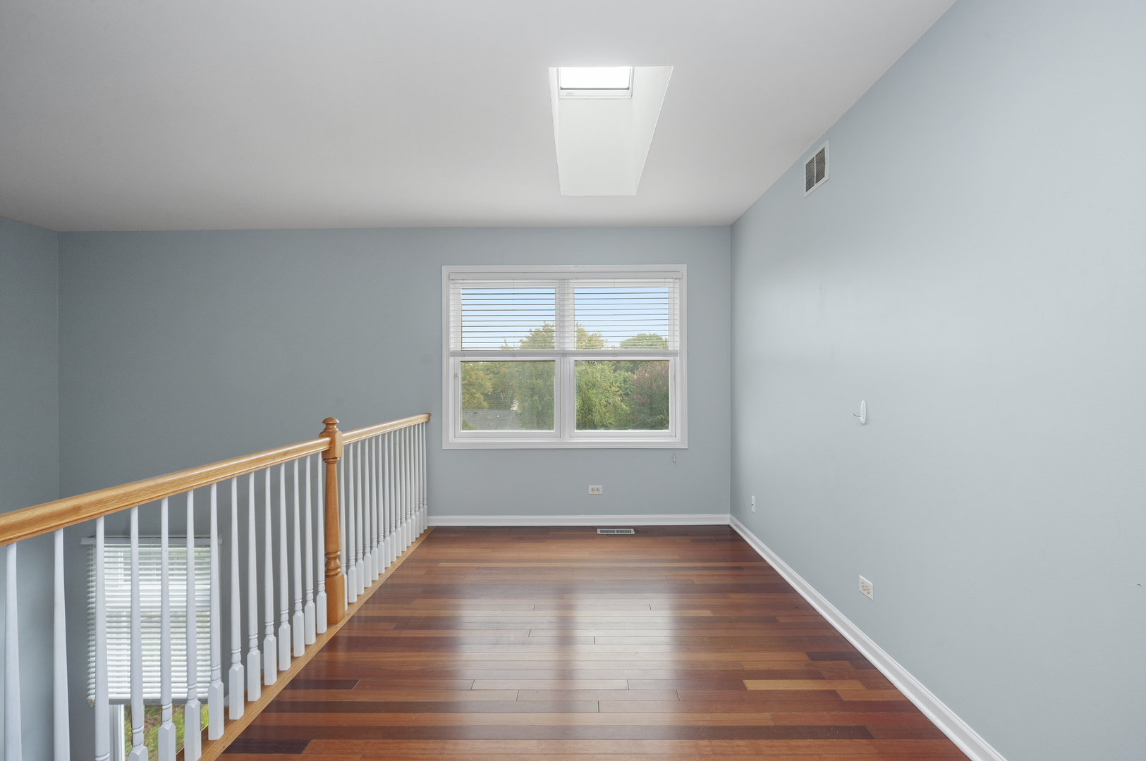 315 Spring Point Drive Carpentersville, IL 60110 - Photo 19 of 21 a view of hallway with wooden floor