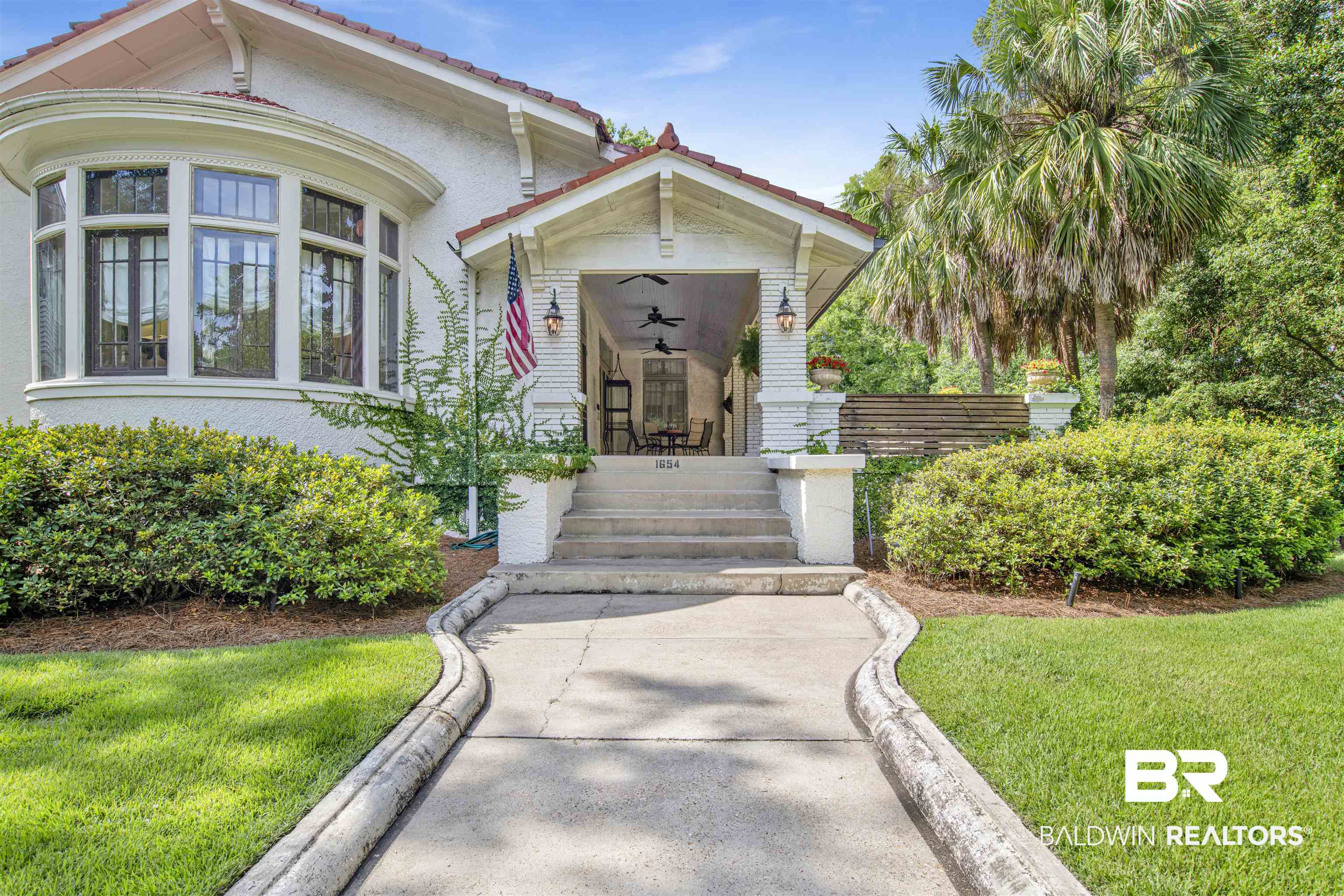 1654 Government Street Mobile, AL 36604 - Photo 4 of 45 View of front of house with a front yard