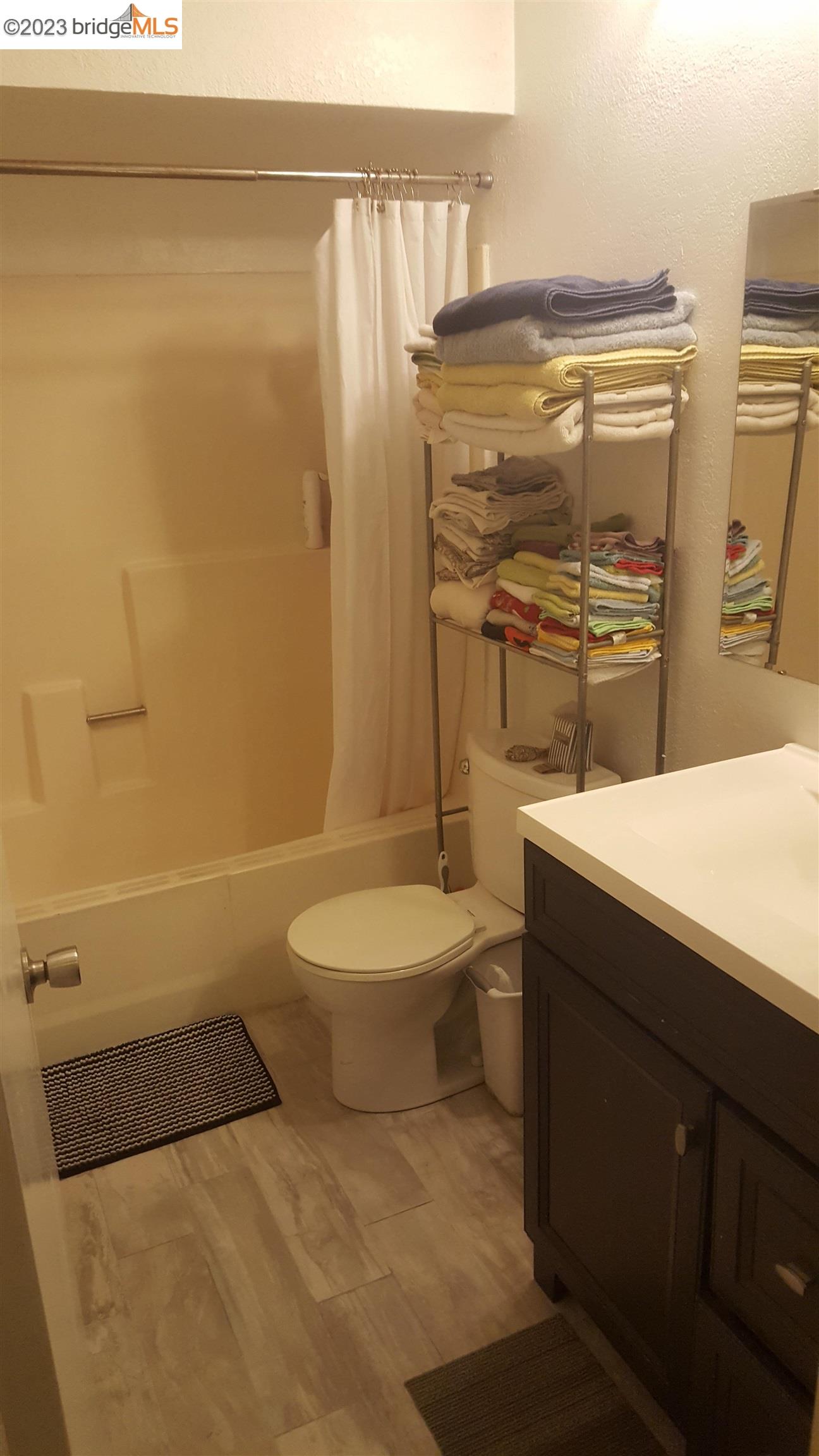 2416 Shadow Lane, Unit 75 Antioch, CA 94509 - Photo 19 of 26 a bathroom with a sink a toilet and shower