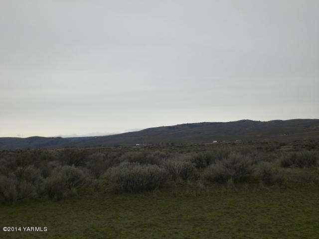 382 Hideaway Road Yakima, WA 98908 - Photo 12 of 41 a view of a mountain range with trees in the background