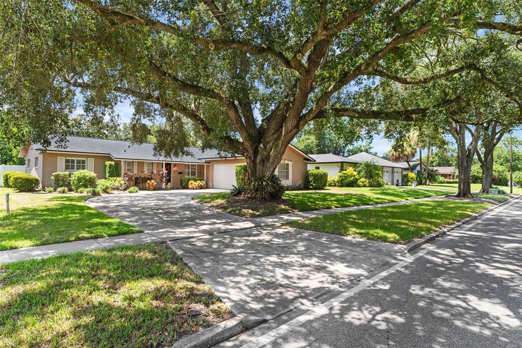 2774 Banchory Road Winter Park, FL 32792 - Photo 2 of 30 a front view of a house with a yard