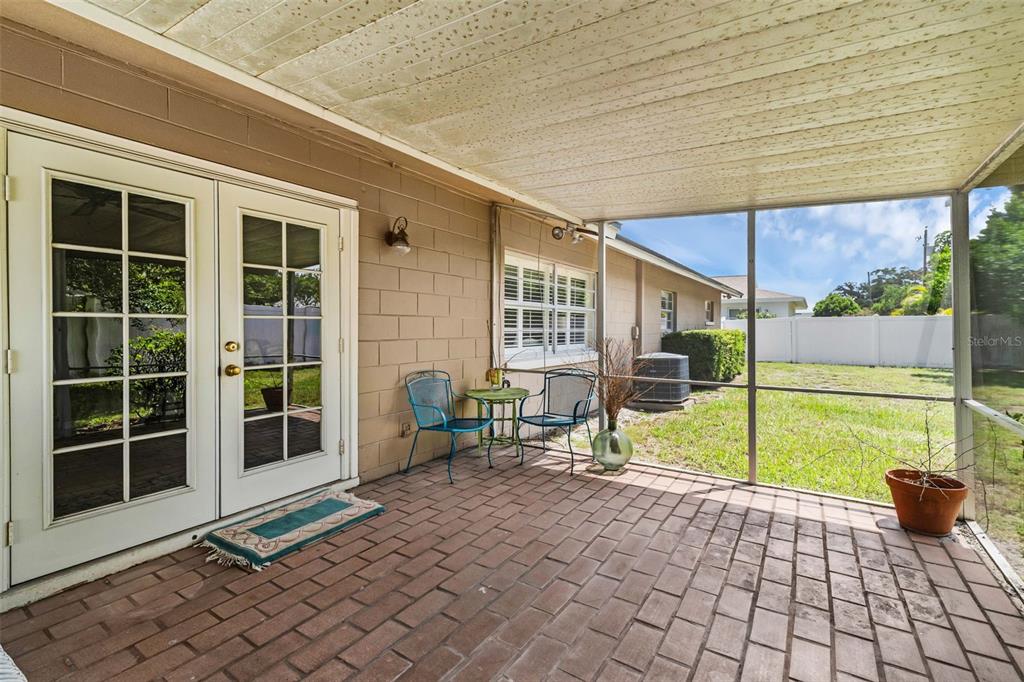 2774 Banchory Road Winter Park, FL 32792 - Photo 23 of 30 a view of house with backyard porch and furniture