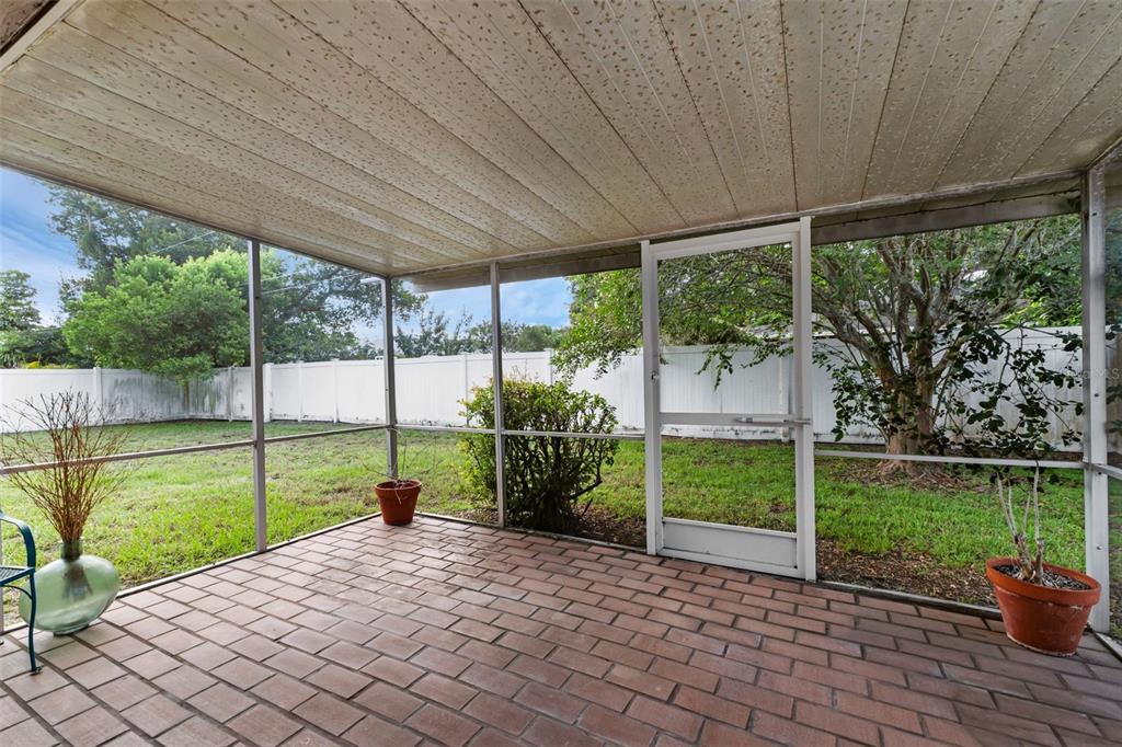 2774 Banchory Road Winter Park, FL 32792 - Photo 24 of 30 a view of a backyard with plants and a backyard