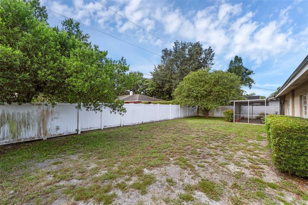 2774 Banchory Road Winter Park, FL 32792 - Photo 29 of 30 a view of a house with a yard