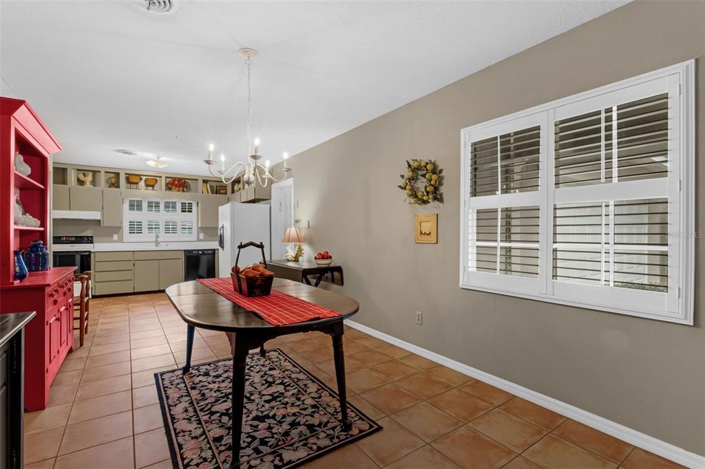 2774 Banchory Road Winter Park, FL 32792 - Photo 6 of 30 a view of a dining room with furniture and a window
