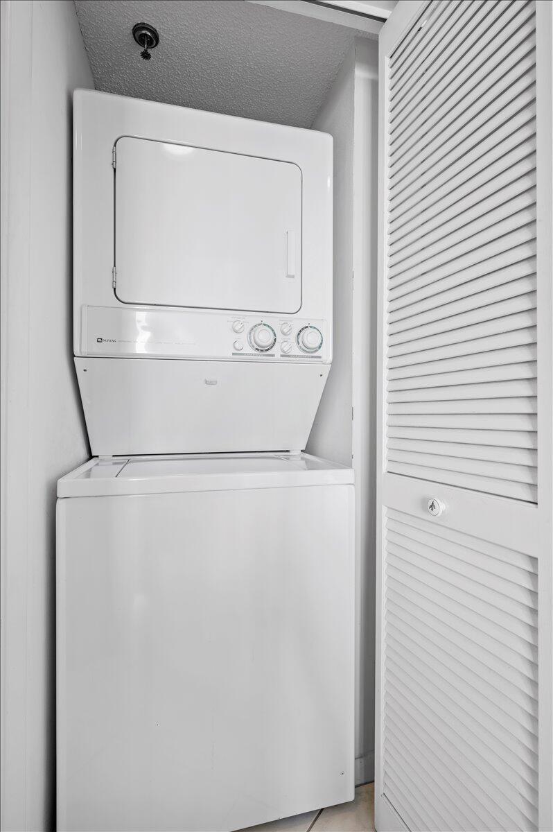 100 Ocean Trail Way, Unit 1403 Jupiter, FL 33477 - Photo 17 of 30 a close view of washer and dryer