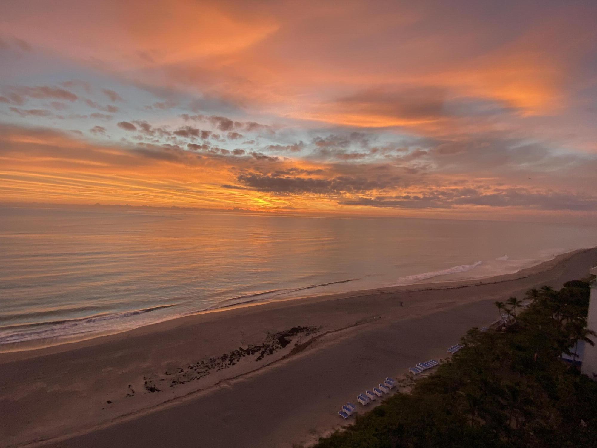 100 Ocean Trail Way, Unit 1403 Jupiter, FL 33477 - Photo 30 of 30 a view of an ocean and beach