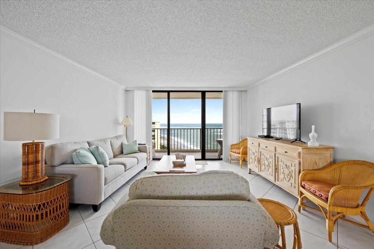 100 Ocean Trail Way, Unit 1403 Jupiter, FL 33477 - Photo 6 of 30 a bedroom with furniture and a window