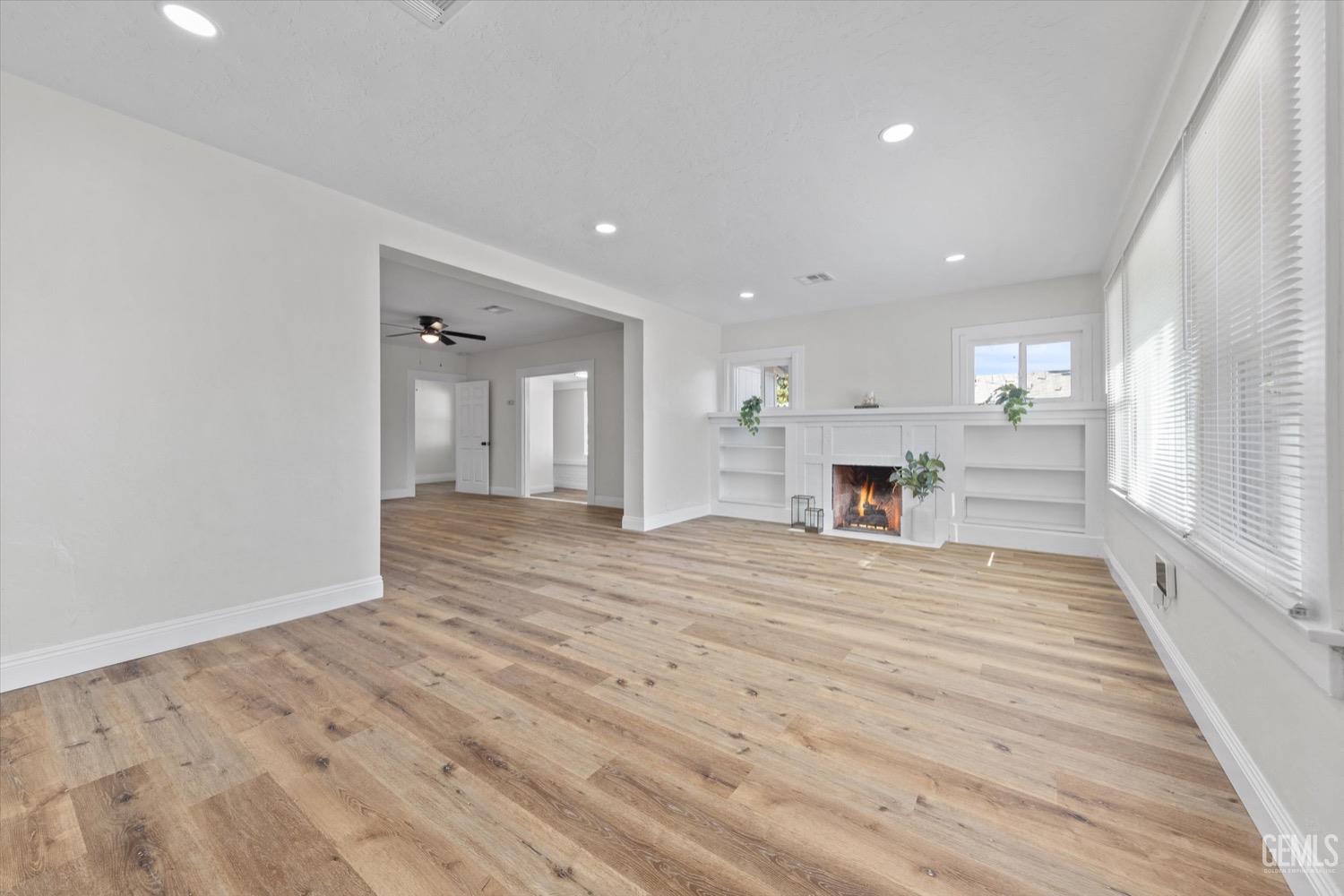 Undisclosed Address Bakersfield, CA 93304 - Photo 13 of 47 a view of a kitchen with a sink and a refrigerator