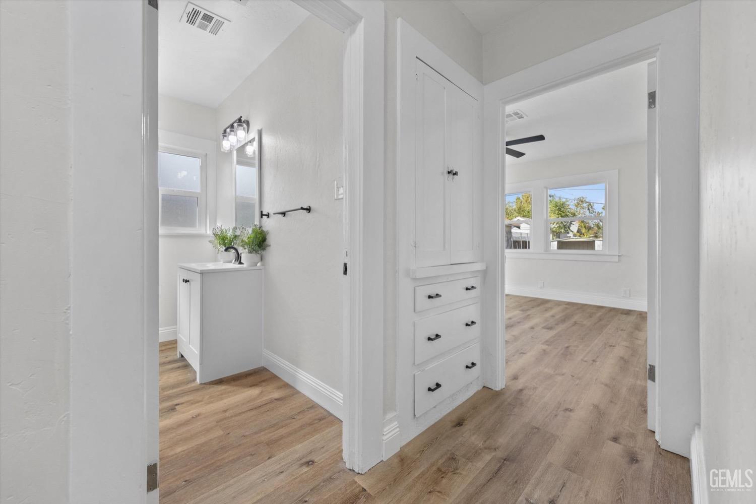 Undisclosed Address Bakersfield, CA 93304 - Photo 32 of 47 wooden floor with white walls