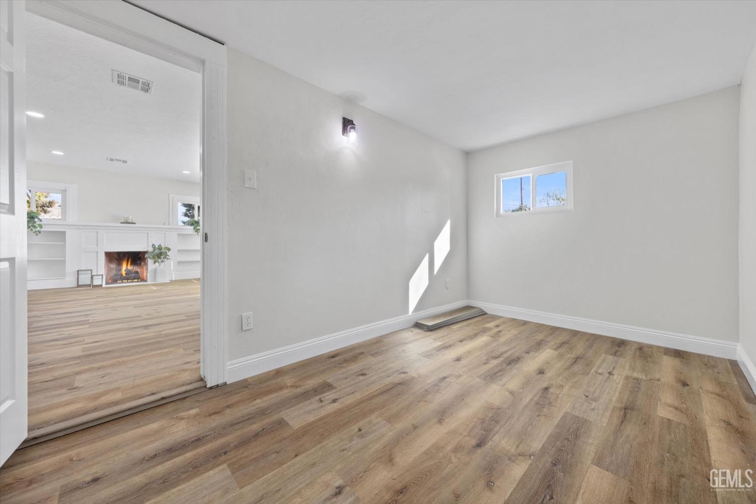 Undisclosed Address Bakersfield, CA 93304 - Photo 39 of 47 a view of empty room with wooden floor
