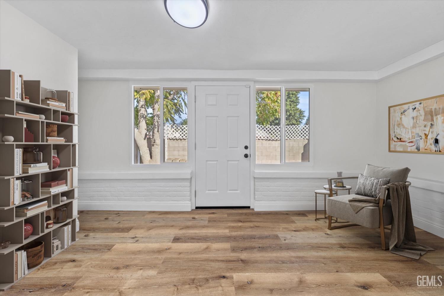 Undisclosed Address Bakersfield, CA 93304 - Photo 9 of 47 a room with furniture and a window