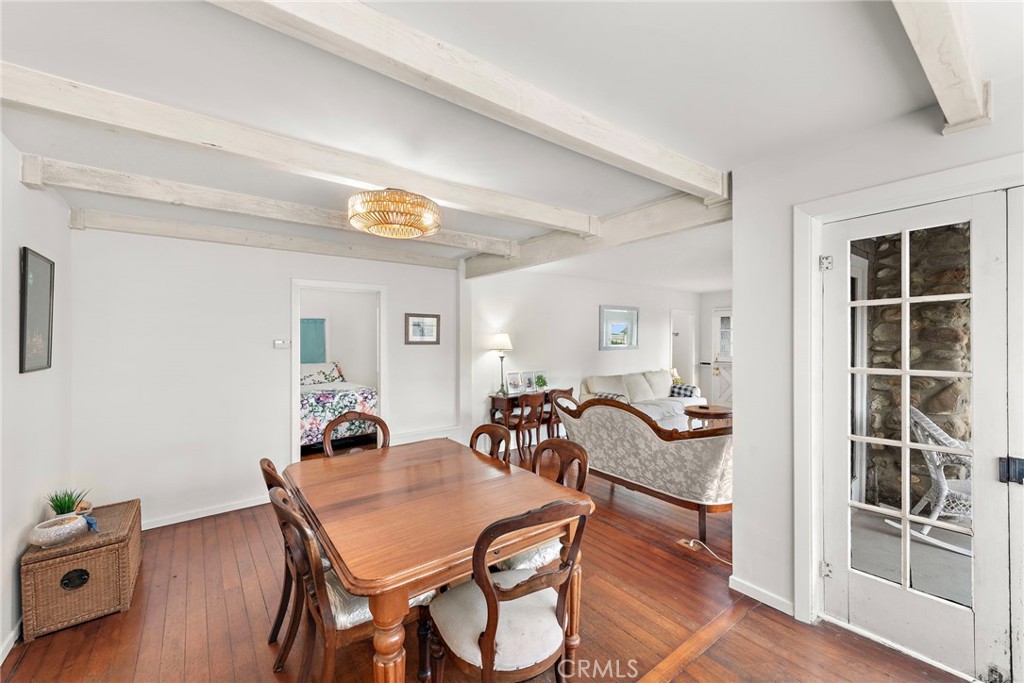 290 Diamond Street Laguna Beach, CA 92651 - Photo 11 of 30 a view of a dining room with furniture and wooden floor