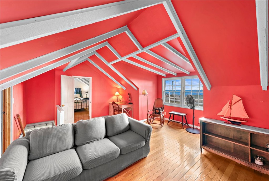 290 Diamond Street Laguna Beach, CA 92651 - Photo 23 of 30 a living room with furniture and a window