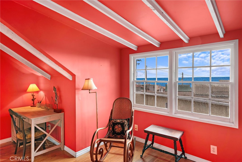 290 Diamond Street Laguna Beach, CA 92651 - Photo 24 of 30 a blue chair and table in a room