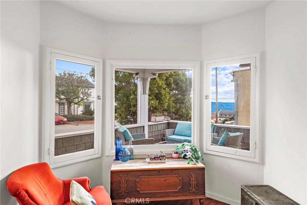 290 Diamond Street Laguna Beach, CA 92651 - Photo 5 of 30 a living room with furniture and a potted plant