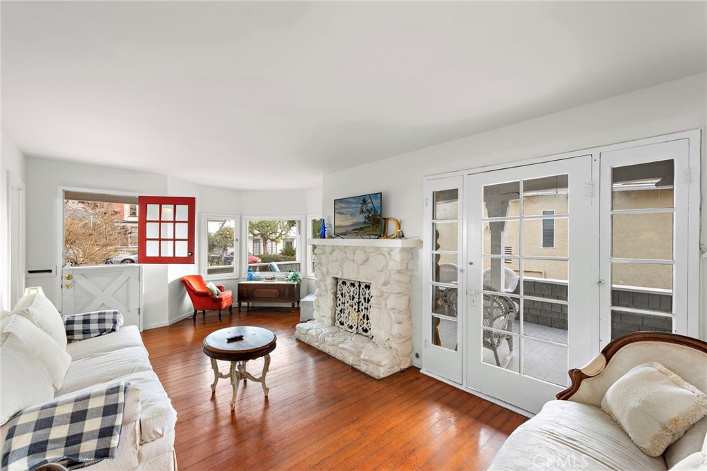 290 Diamond Street Laguna Beach, CA 92651 - Photo 9 of 30 a living room with furniture and a large window