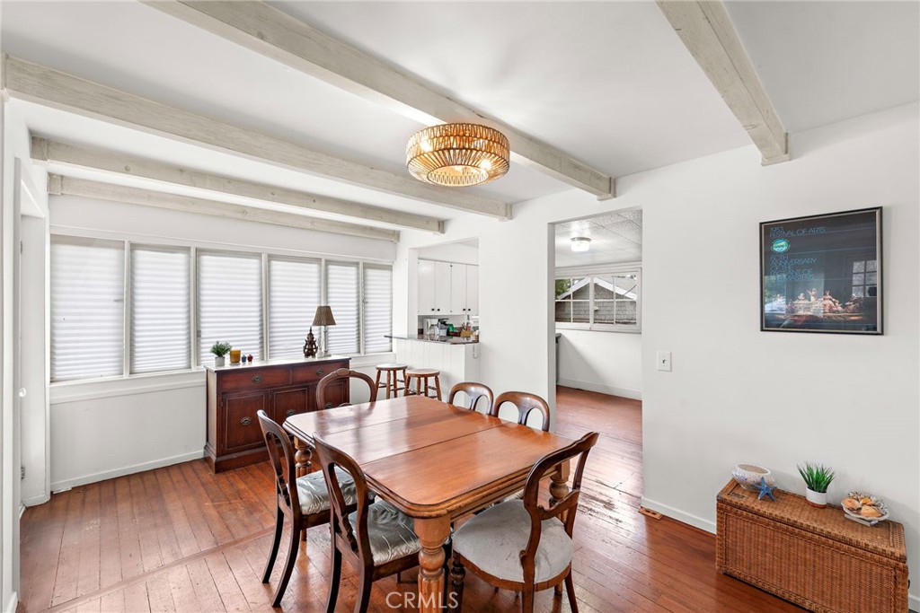 290 Diamond Street Laguna Beach, CA 92651 - Photo 10 of 30 a view of a dining room with furniture and wooden floor