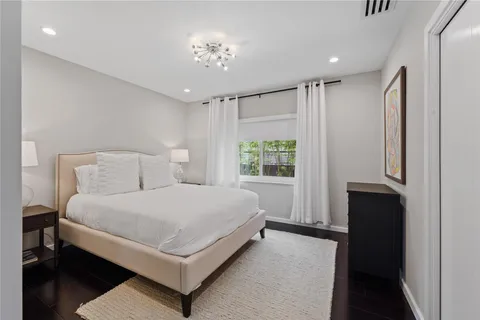 a bathroom with a shower and toilet