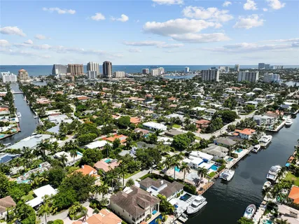 an aerial view of a house with fire pit