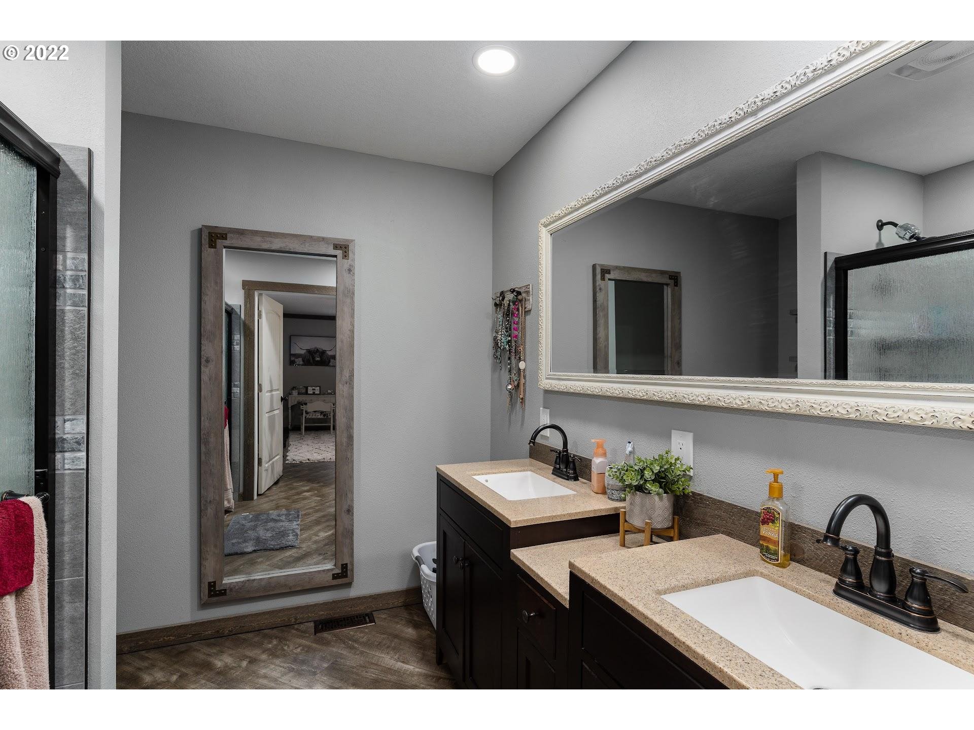 12275 Southeast School Avenue Boring, OR 97009 - Photo 12 of 14 a bathroom with a sink and a mirror