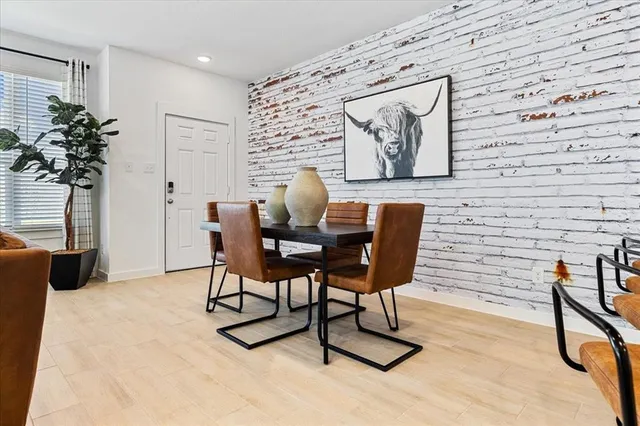 a workspace with furniture and a potted plant