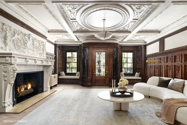 a black and white photo of a living room