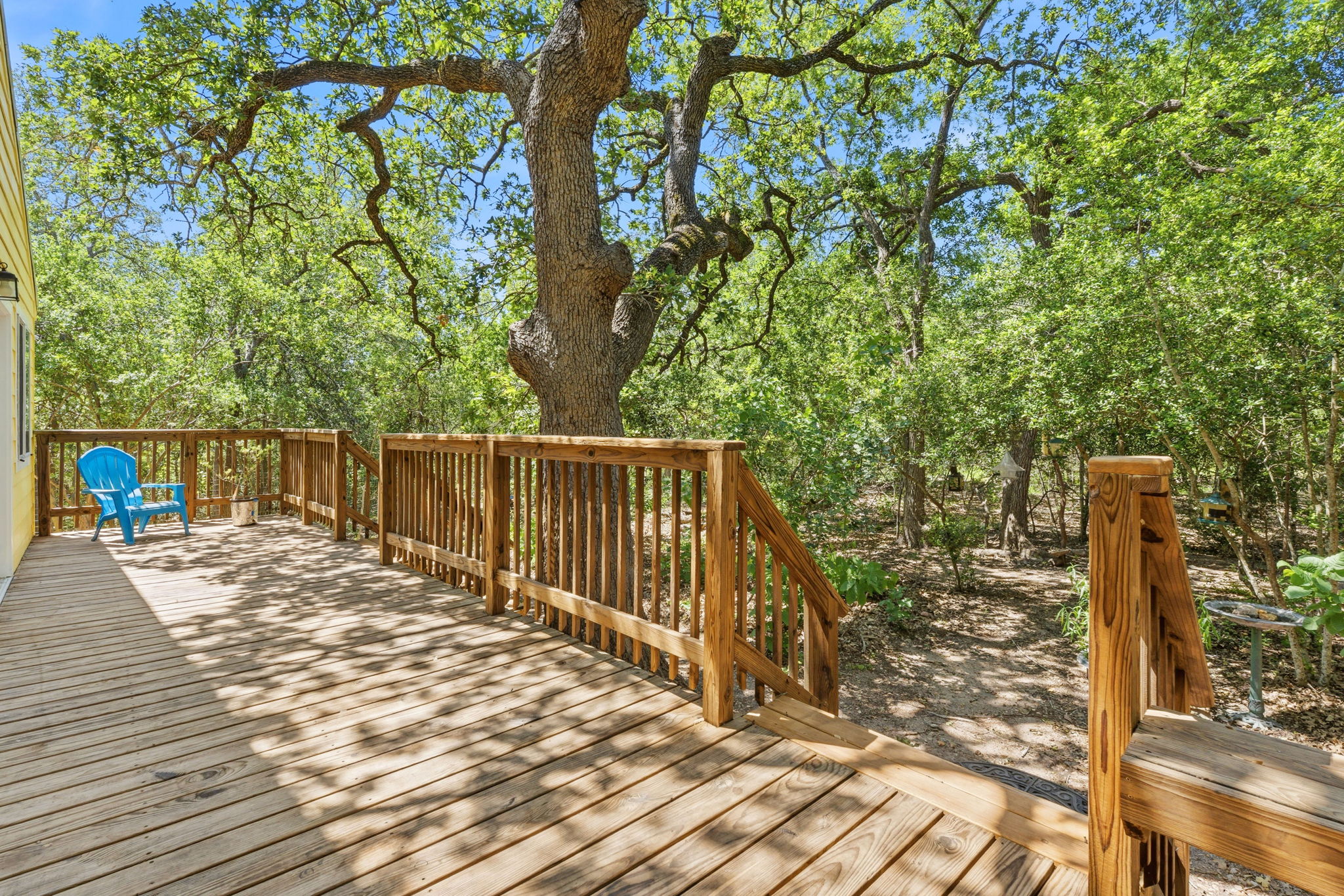 1998 Upper Elgin River Road Elgin, TX 78621 - Photo 10 of 28 a view of terrace with wooden floor and fence