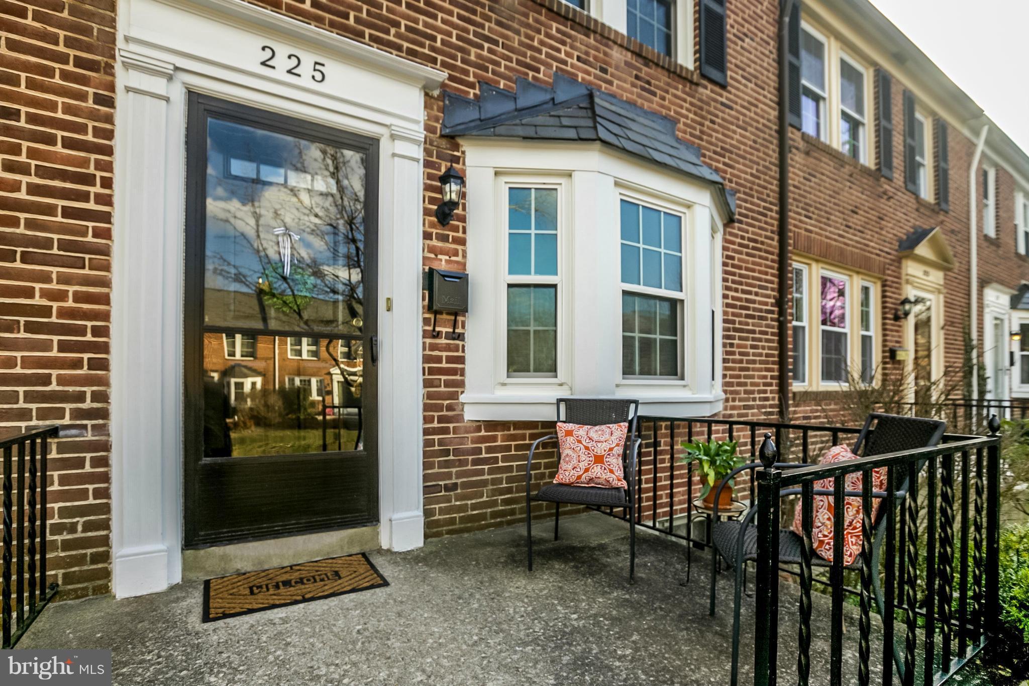 225 Overbrook Road Baltimore, MD 21212 - Photo 2 of 28 a view of a brick house with large windows