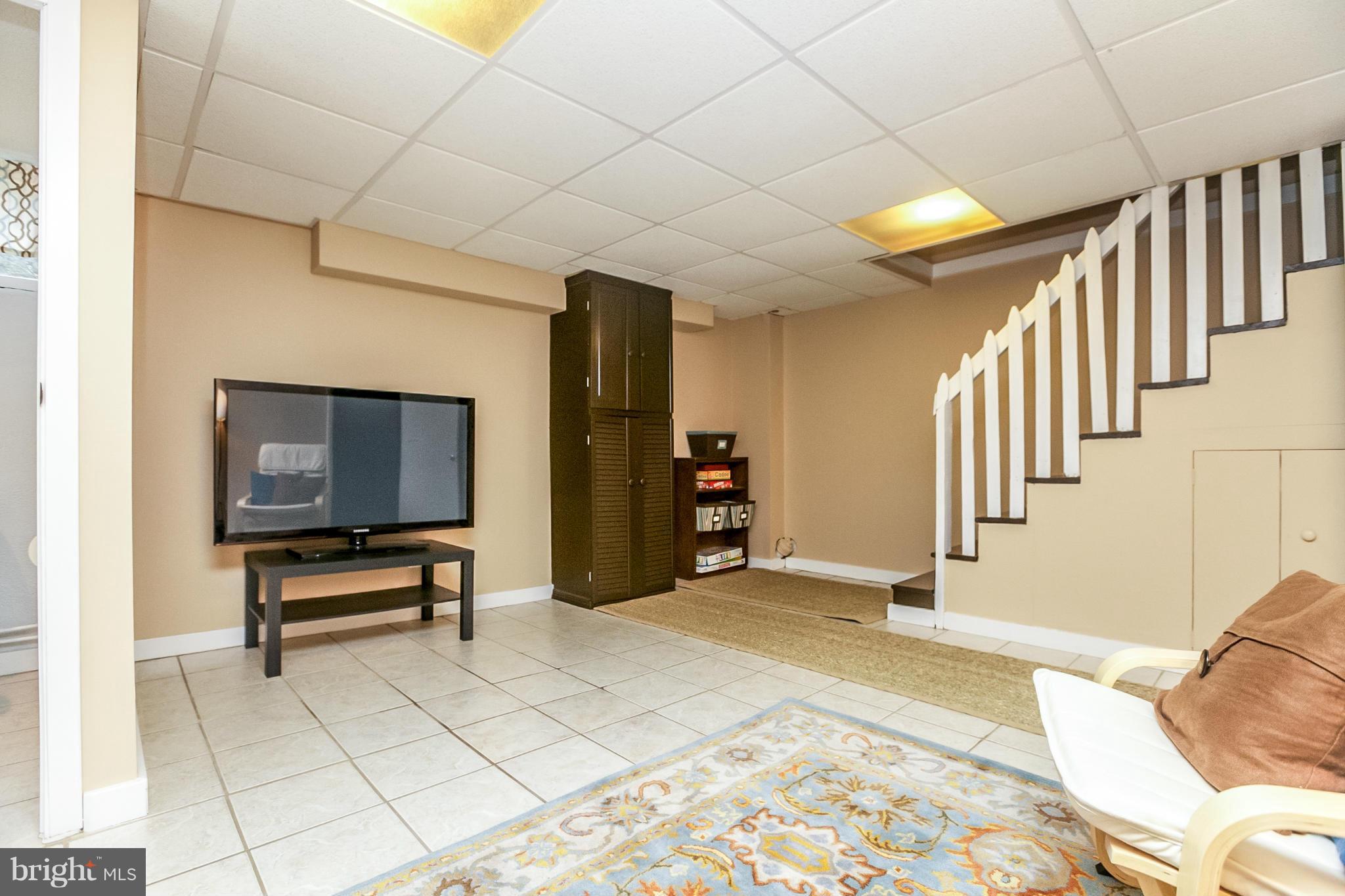 225 Overbrook Road Baltimore, MD 21212 - Photo 14 of 28 a bedroom with furniture and a window