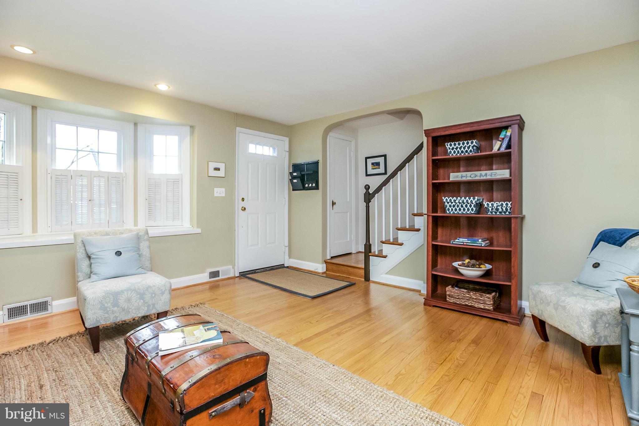 225 Overbrook Road Baltimore, MD 21212 - Photo 5 of 28 a bedroom with furniture and a wooden floor