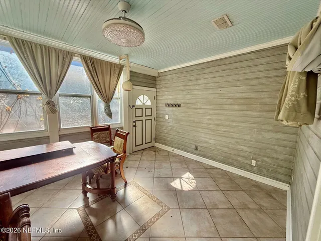 a bathroom with a sink a mirror and a shower