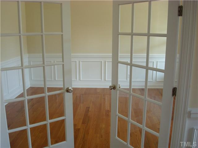 700 Ivyshaw Road Cary, NC 27519 - Photo 5 of 23 formal living room with french doors
