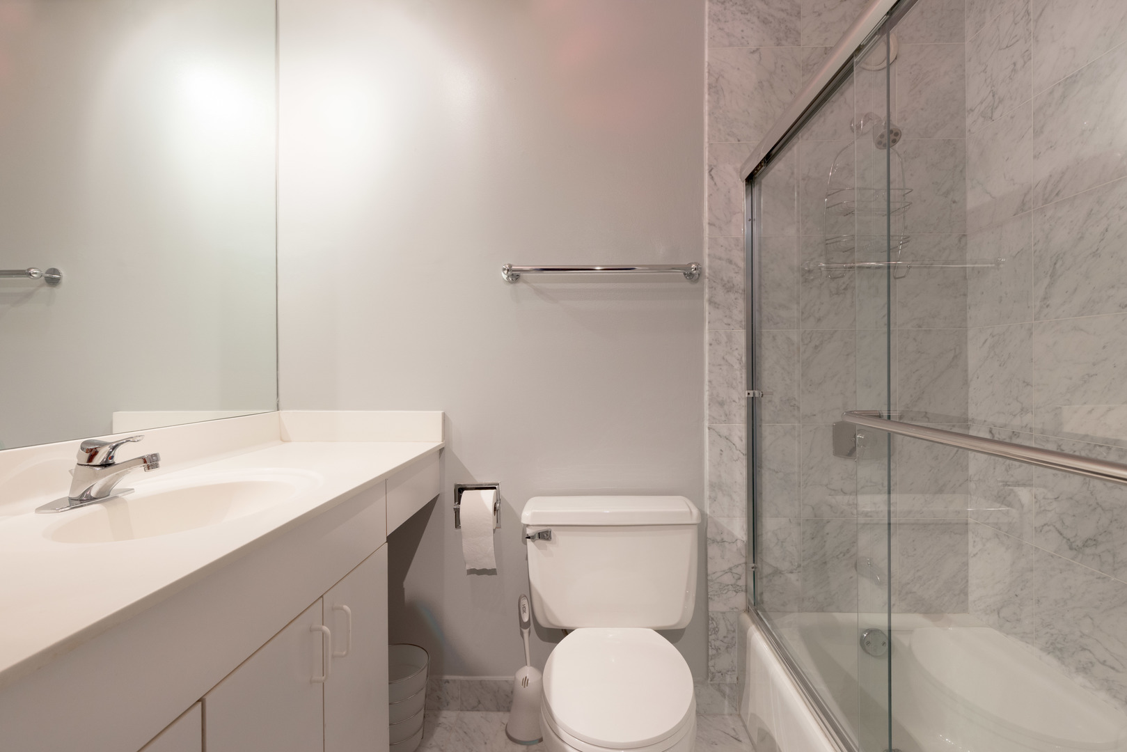 345 West Fullerton Parkway, Unit 1001 Chicago, IL 60614 - Photo 12 of 16 a bathroom with a sink a toilet and shower