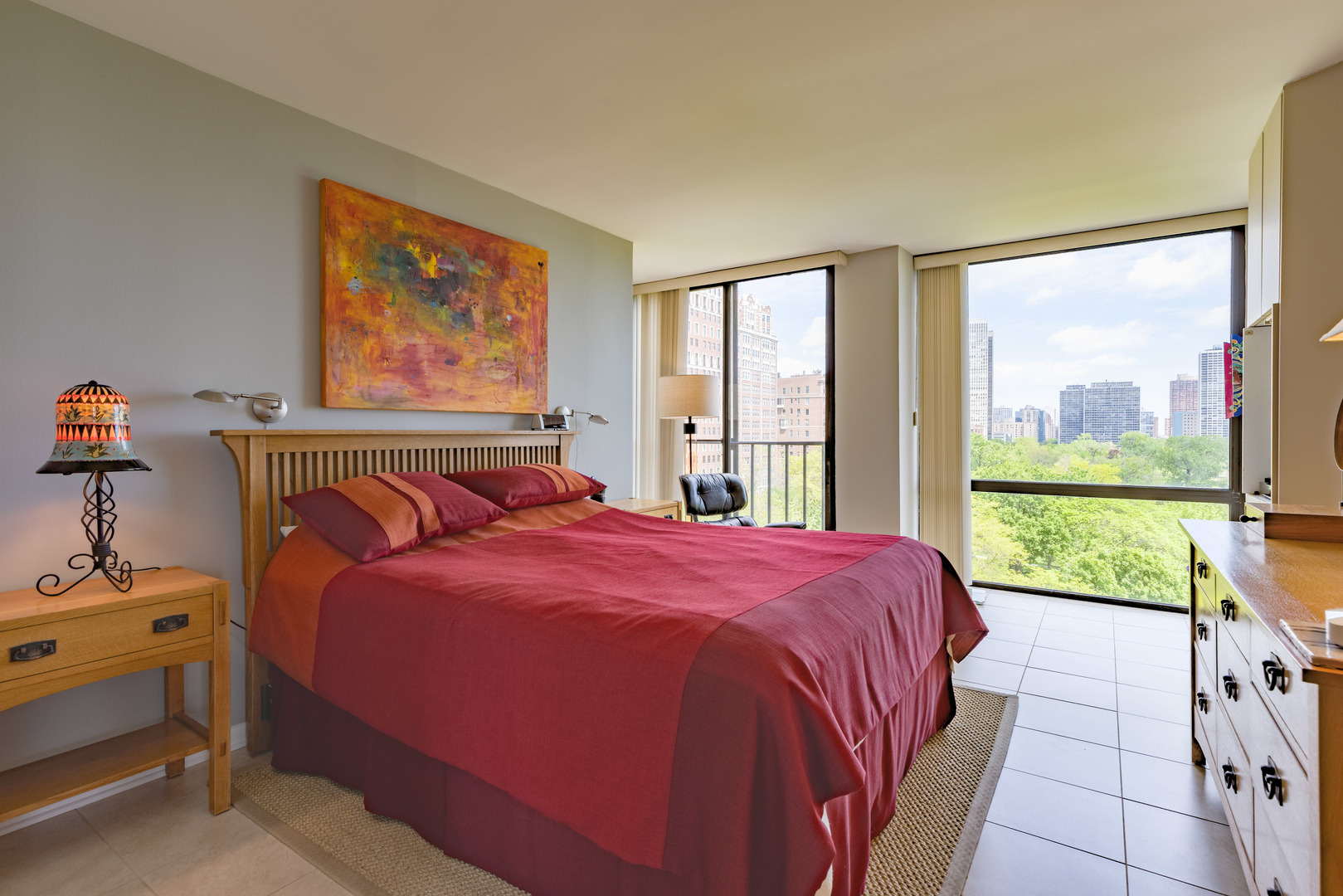 345 West Fullerton Parkway, Unit 1001 Chicago, IL 60614 - Photo 10 of 16 a bedroom with a bed and a large window