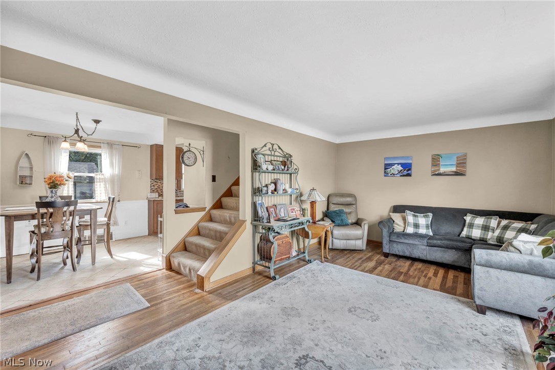 30002 Barjode Road Willowick, OH 44095 - Photo 12 of 33 Living room featuring wood finished floors and stairs