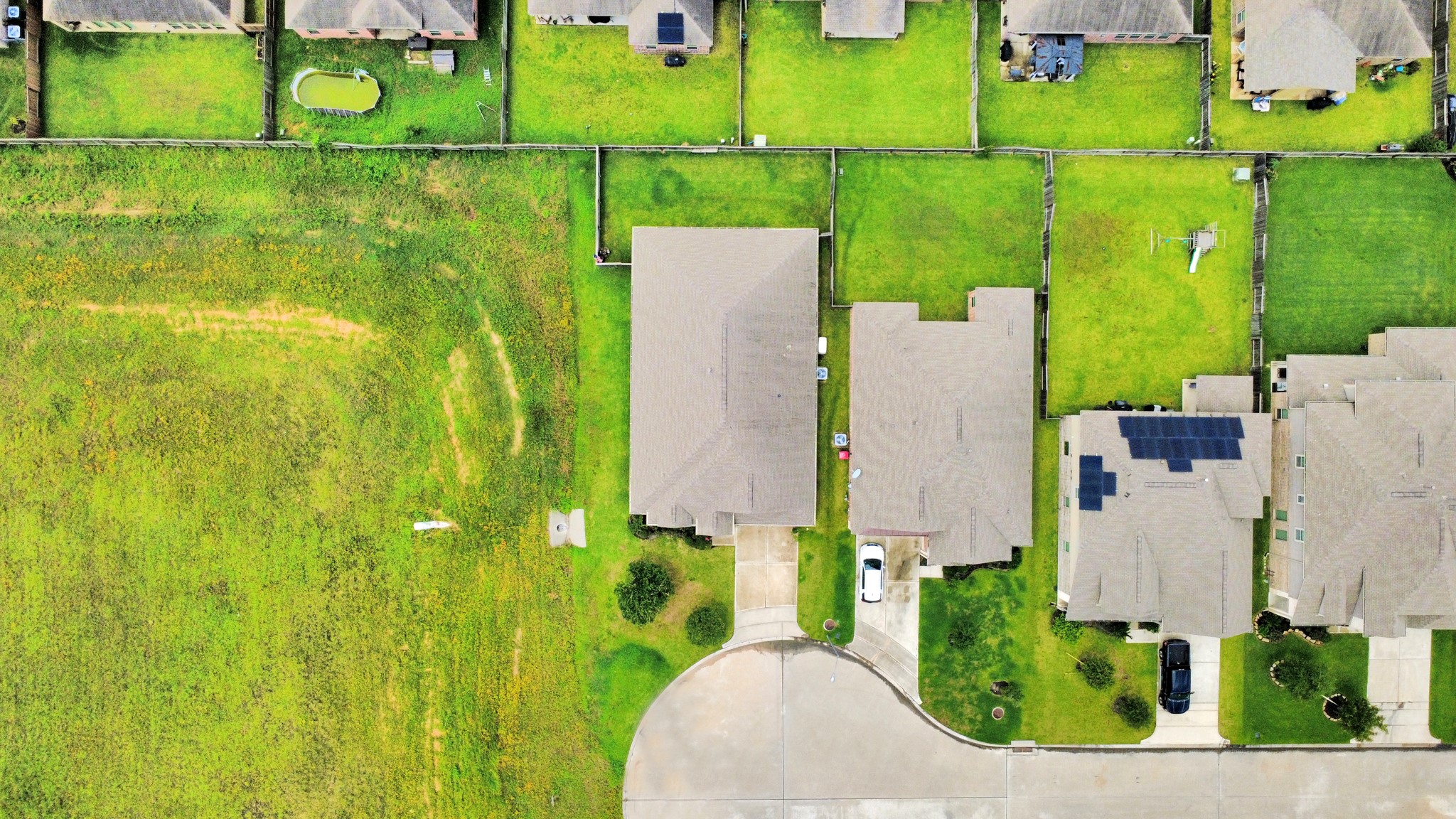 24503 Eucalyptus Way Spring, TX 77373 - Photo 27 of 27 an aerial view of residential houses with outdoor space and swimming pool