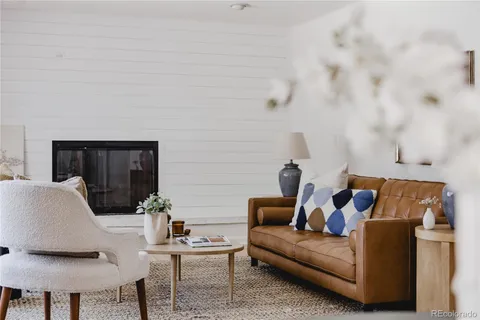 a living room with furniture and a couch