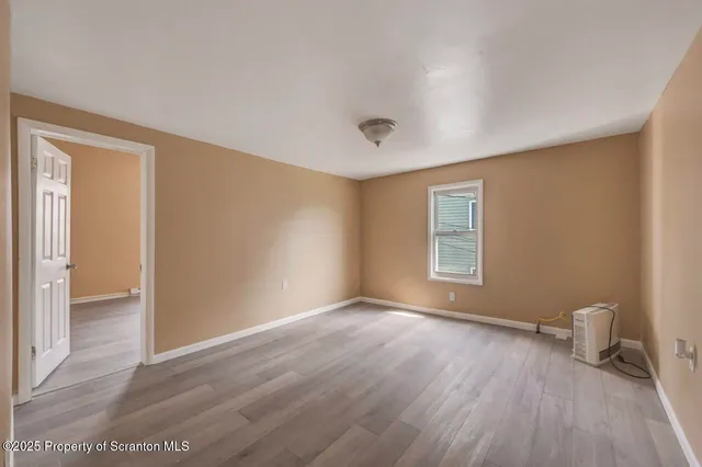 a view of a street with cars