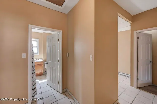 a bedroom with bed and a closet