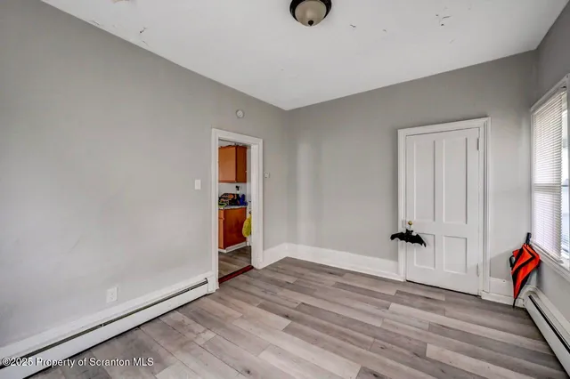a room with toys and wooden floor